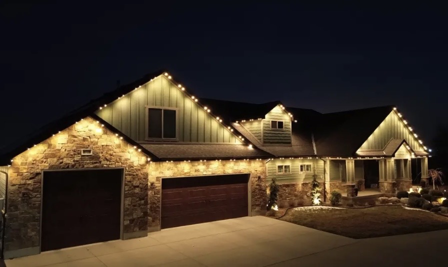 Warm White permanent roofline lighting on a home