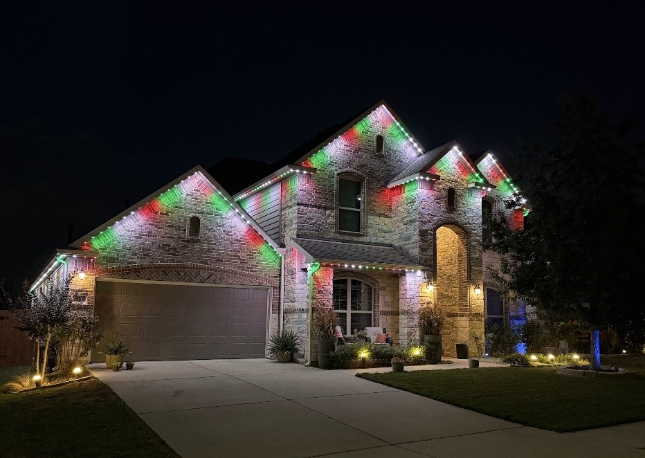 Christmas Color Mix permanent roofline lighting on a home